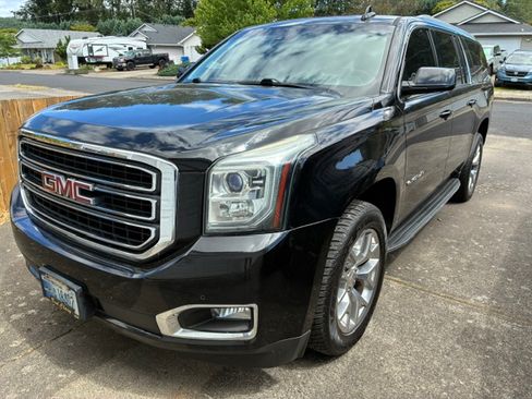 Used 2015 GMC Yukon XL SLT w/ Open Road Package AWD/4WD image 1