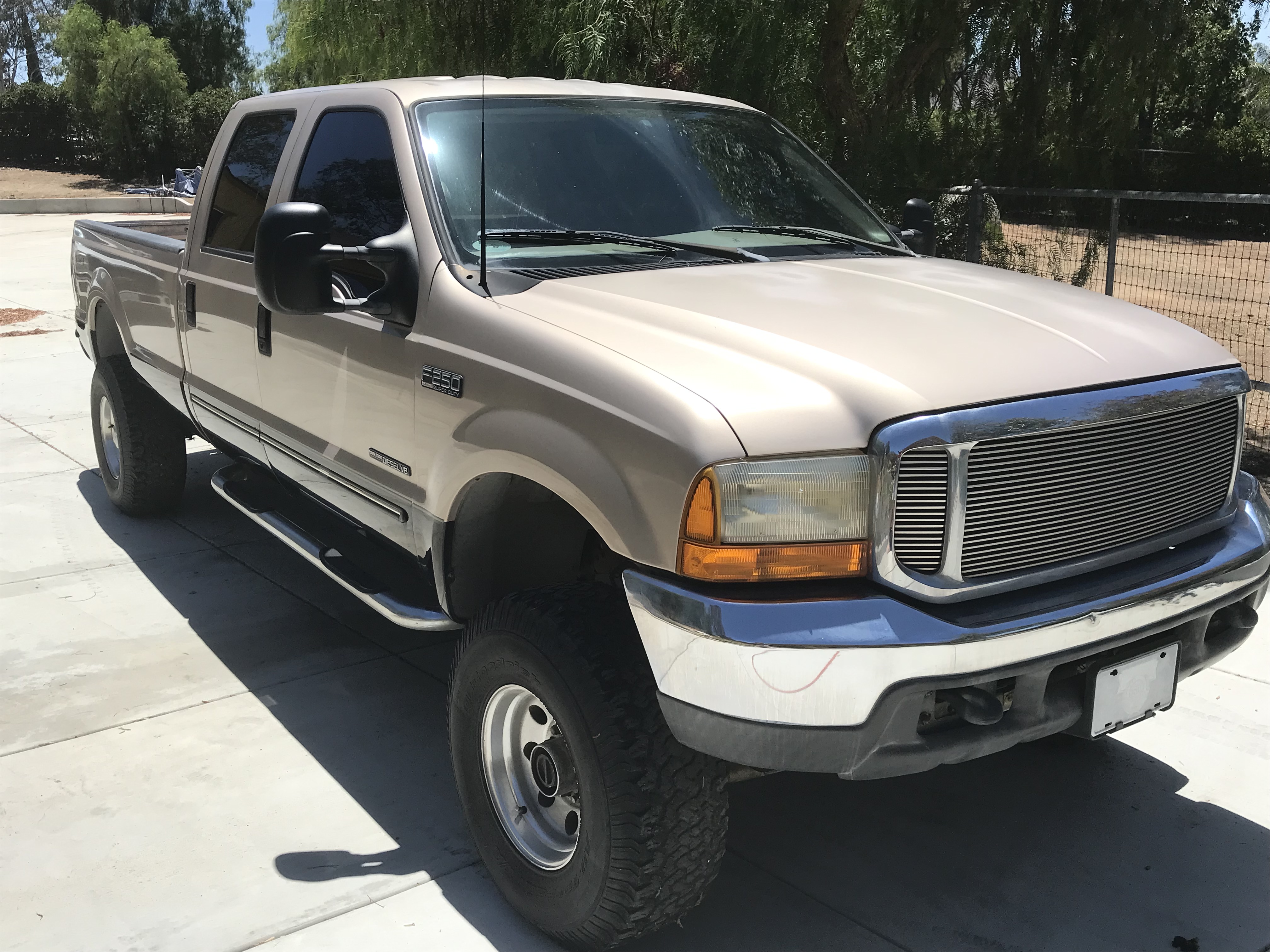 Used 1999 Ford F250 4x4 Crew Cab Super Duty image 1