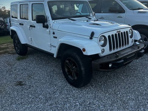 Used 2016 Jeep Wrangler Unlimited Sahara image 1