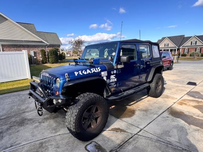 Used 2010 Jeep Wrangler Unlimited Sport