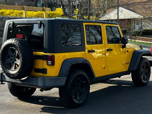 Used 2009 Jeep Wrangler Unlimited Rubicon w/ Dual Top Group image 2