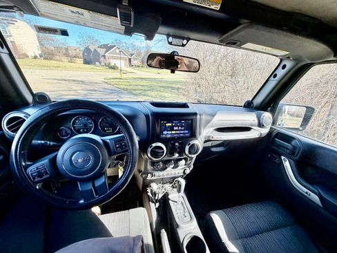 Used 2012 Jeep Wrangler Unlimited Sahara w/ Dual Top Group image 11