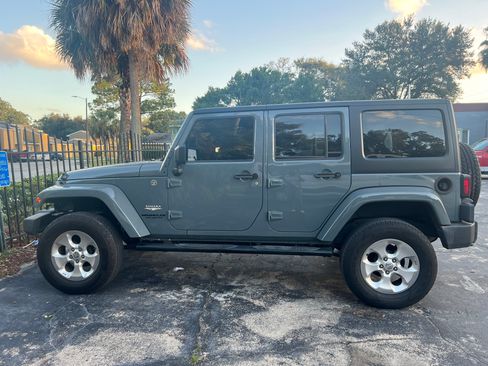Used 2015 Jeep Wrangler Unlimited Sahara w/ Max Tow Package image 2