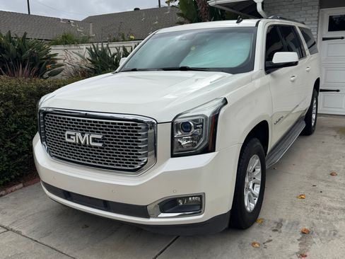 Used 2015 GMC Yukon XL SLT w/ Open Road Package image 1