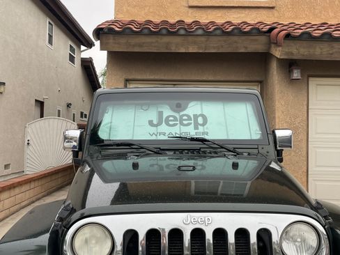 Used 2012 Jeep Wrangler Unlimited Sahara w/ Mopar Chrome Edition Group image 2