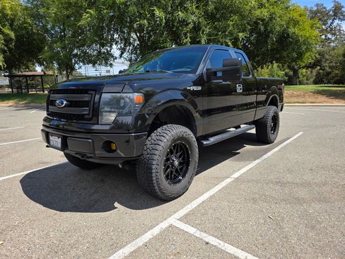 Used 2013 Ford F150 STX w/ Mid Equipment Group AWD/4WD image 1
