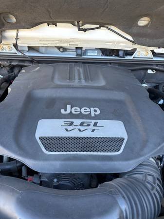 Used 2012 Jeep Wrangler Sahara w/ Dual Top Group AWD/4WD image 17