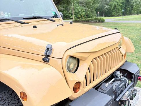 Used 2013 Jeep Wrangler Unlimited Sahara w/ Mopar Chrome Edition Group AWD/4WD image 2