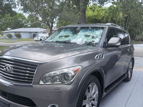 Used 2013 INFINITI QX56 4WD w/ Deluxe Touring Pkg image 1