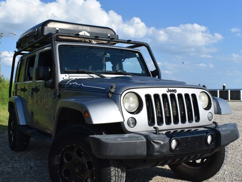 Used 2014 Jeep Wrangler Unlimited Sahara image 1