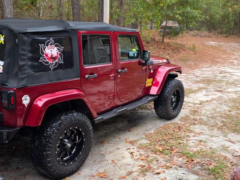 Used 2011 Jeep Wrangler Unlimited Sahara w/ Dual Top Group image 1