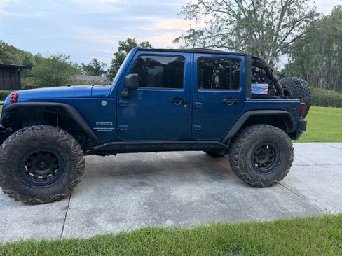 Used 2010 Jeep Wrangler Unlimited Sport AWD/4WD image 1