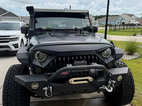 Used 2009 Jeep Wrangler Unlimited X AWD/4WD image 1