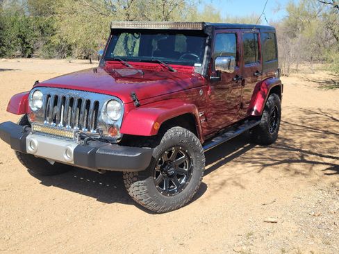 Used 2011 Jeep Wrangler Unlimited Sahara w/ Mopar Chrome Edition Group image 1