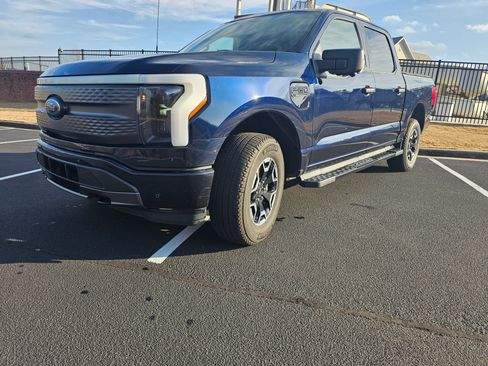 Used 2023 Ford F150 Lightning XLT image 1