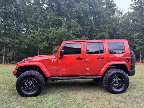 Used 2009 Jeep Wrangler Unlimited Rubicon w/ Dual Top Group AWD/4WD image 6