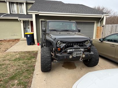 Used 2011 Jeep Wrangler Unlimited Rubicon w/ Dual Top Group