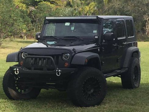 Used 2010 Jeep Wrangler Unlimited Sport image 1