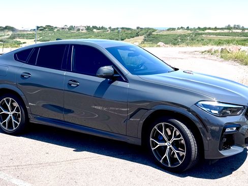 Used 2021 BMW X6 M50i AWD/4WD image 1