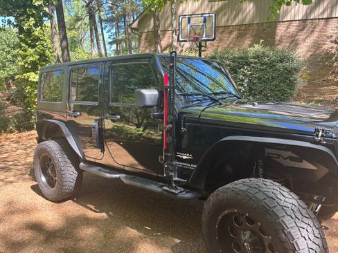 Used 2014 Jeep Wrangler Unlimited Sahara w/ Dual Top Group image 2