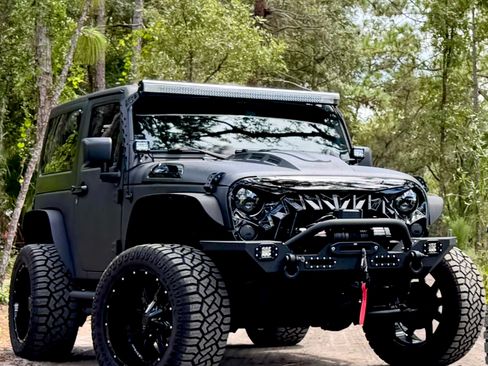 Used 2013 Jeep Wrangler Sport image 1