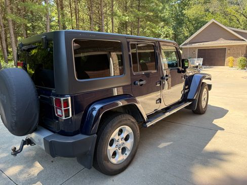 Used 2013 Jeep Wrangler Unlimited Sahara w/ Mopar Chrome Edition Group AWD/4WD image 4