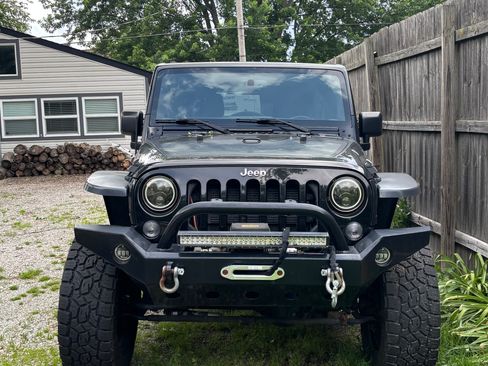Used 2015 Jeep Wrangler Unlimited Sahara AWD/4WD image 1