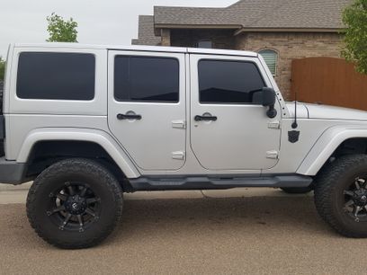 Used 2012 Jeep Wrangler Unlimited Sahara w/ Dual Top Group