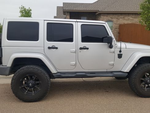 Used 2012 Jeep Wrangler Unlimited Sahara w/ Dual Top Group image 1