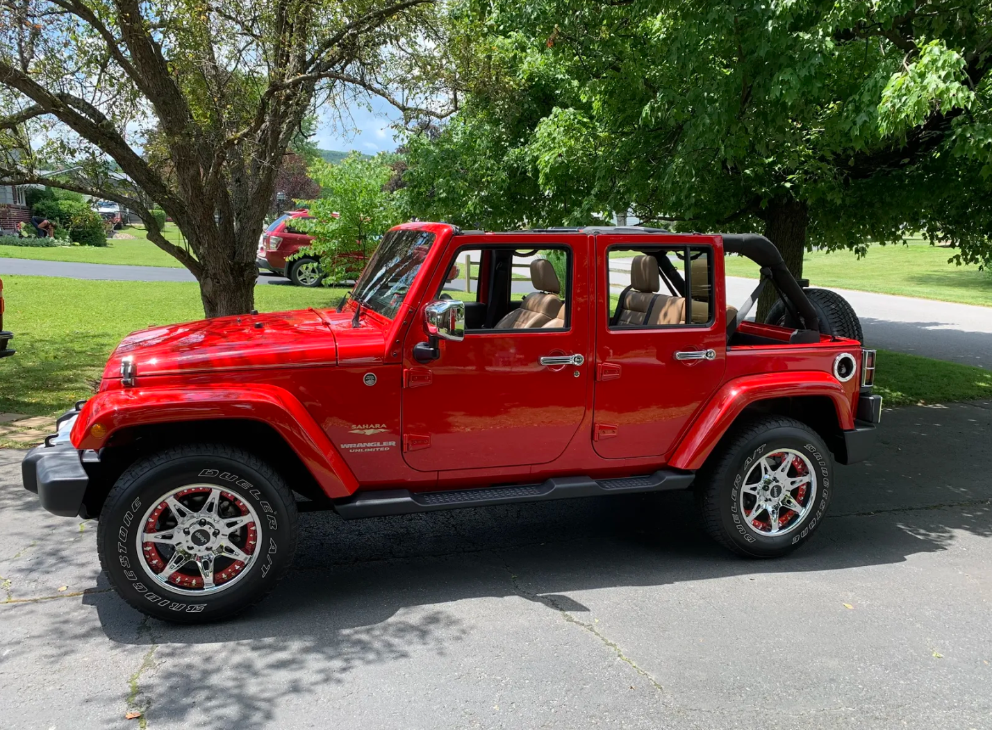 Used 2012 Jeep Wrangler Unlimited Sahara w/ Dual Top Group AWD/4WD image 2