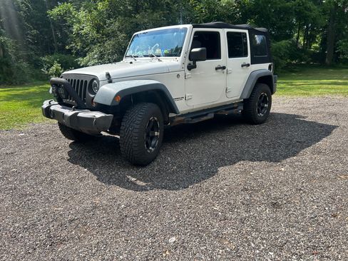 Used 2010 Jeep Wrangler Unlimited Sport AWD/4WD image 1