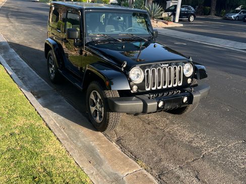 Used 2016 Jeep Wrangler Sahara w/ Dual Top Group AWD/4WD image 1