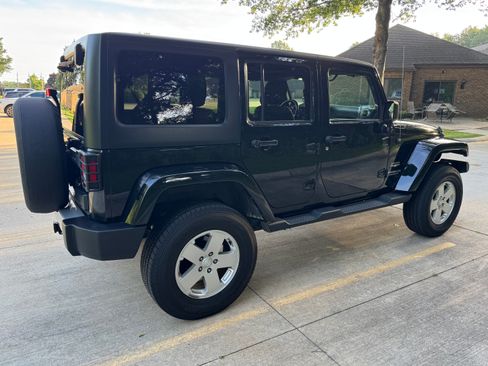 Used 2012 Jeep Wrangler Unlimited Sahara w/ Dual Top Group AWD/4WD image 6