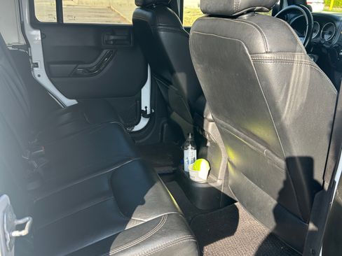 Used 2014 Jeep Wrangler Unlimited Sahara w/ Dual Top Group image 21