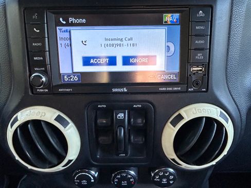 Used 2012 Jeep Wrangler Unlimited Sahara AWD/4WD image 14