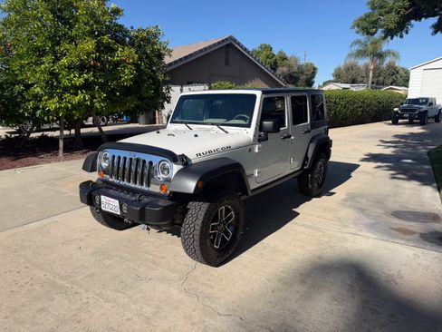 Used 2007 Jeep Wrangler Unlimited Rubicon w/ Dual Top Group AWD/4WD image 1