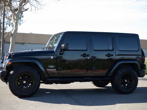 Used 2015 Jeep Wrangler Unlimited Sahara w/ Max Tow Package image 1