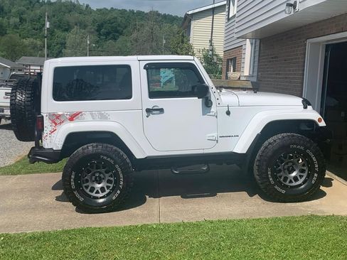 Used 2016 Jeep Wrangler Sahara image 1