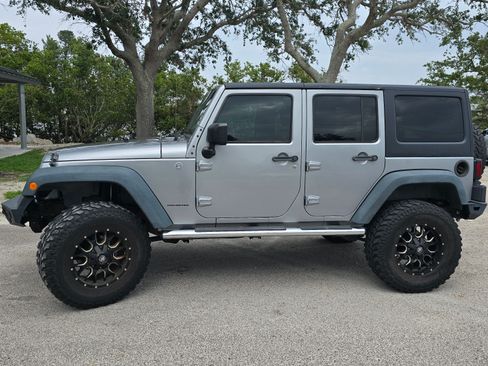 Used 2013 Jeep Wrangler Unlimited Sport image 1