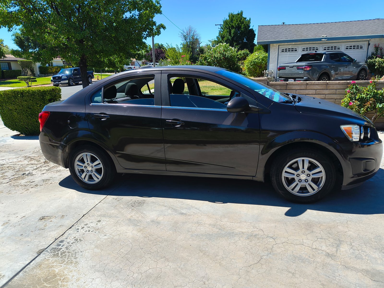 Used 2015 Chevrolet Sonic LT FWD image 1