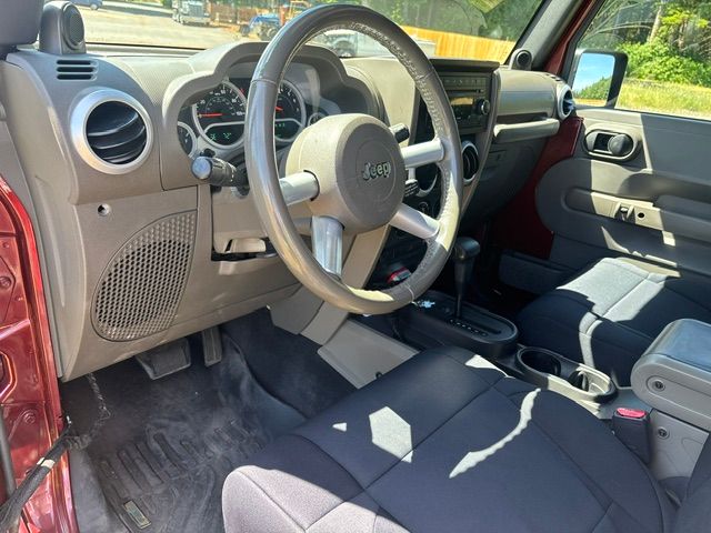 Used 2010 Jeep Wrangler Unlimited Sahara w/ Dual Top Group AWD/4WD image 14