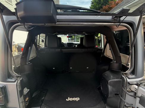 Used 2013 Jeep Wrangler Unlimited Sahara w/ Dual Top Group AWD/4WD image 14