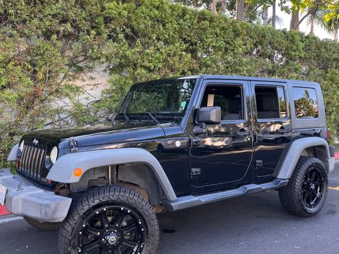 Used 2010 Jeep Wrangler Unlimited Sport AWD/4WD image 1