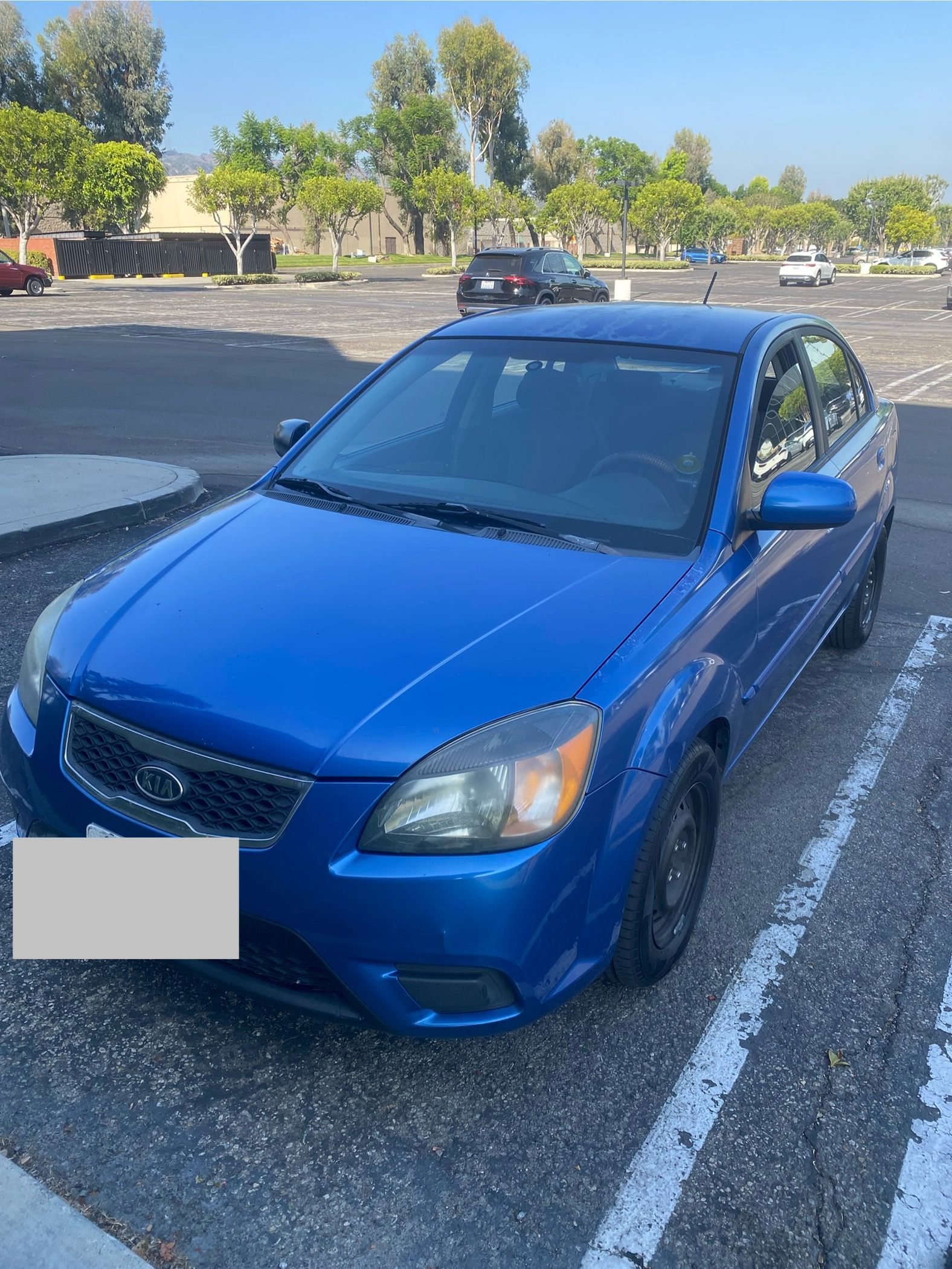 Used 2010 Kia Rio LX FWD image 1
