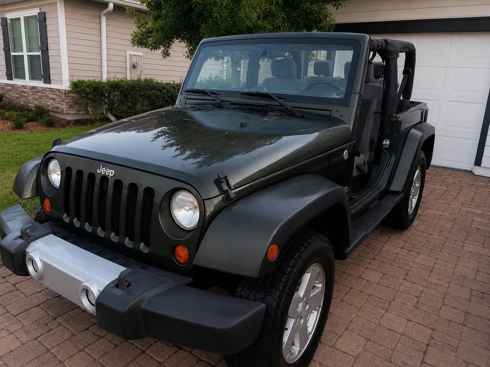 Used 2010 Jeep Wrangler Sahara w/ Dual Top Group AWD/4WD image 1