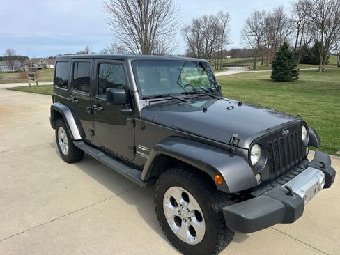 Used 2014 Jeep Wrangler Unlimited Sahara w/ Connectivity Group image 1