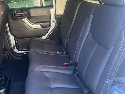 Used 2014 Jeep Wrangler Unlimited Sahara w/ Dual Top Group image 10