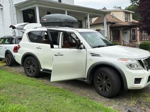 Used 2017 Nissan Armada Platinum w/ Captain Seat Package AWD/4WD image 2