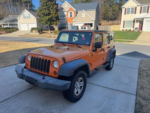 Used 2012 Jeep Wrangler Unlimited Sport w/ Connectivity Group AWD/4WD image 2