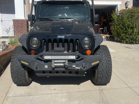 Used 2012 Jeep Wrangler Unlimited Sport image 2